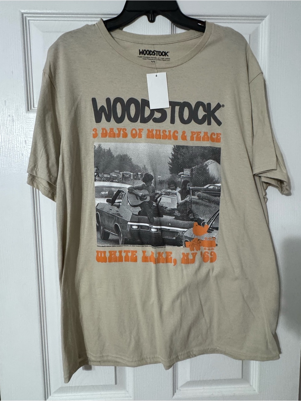 Woodstock Short Sleeve Graphic Tee — Beige with Orange Print